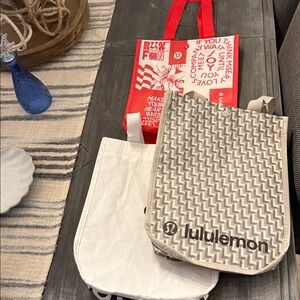 Lululemon tan pattern black and Red Tote Bags reusable. Set of 3 New!!